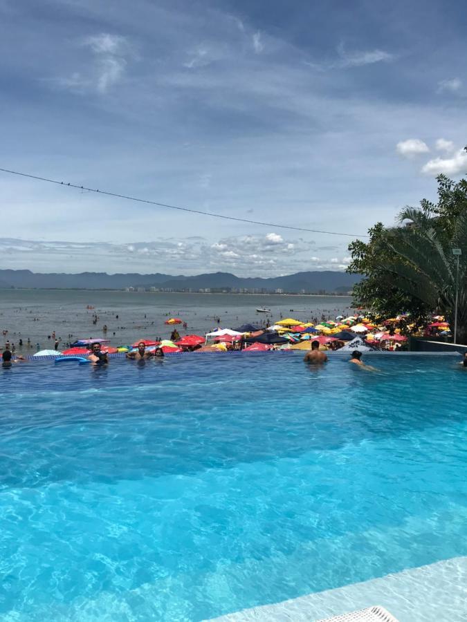 Apartamento pé na areia frente para o Mar e piscina na Prainha Caraguatatuba Extérieur photo