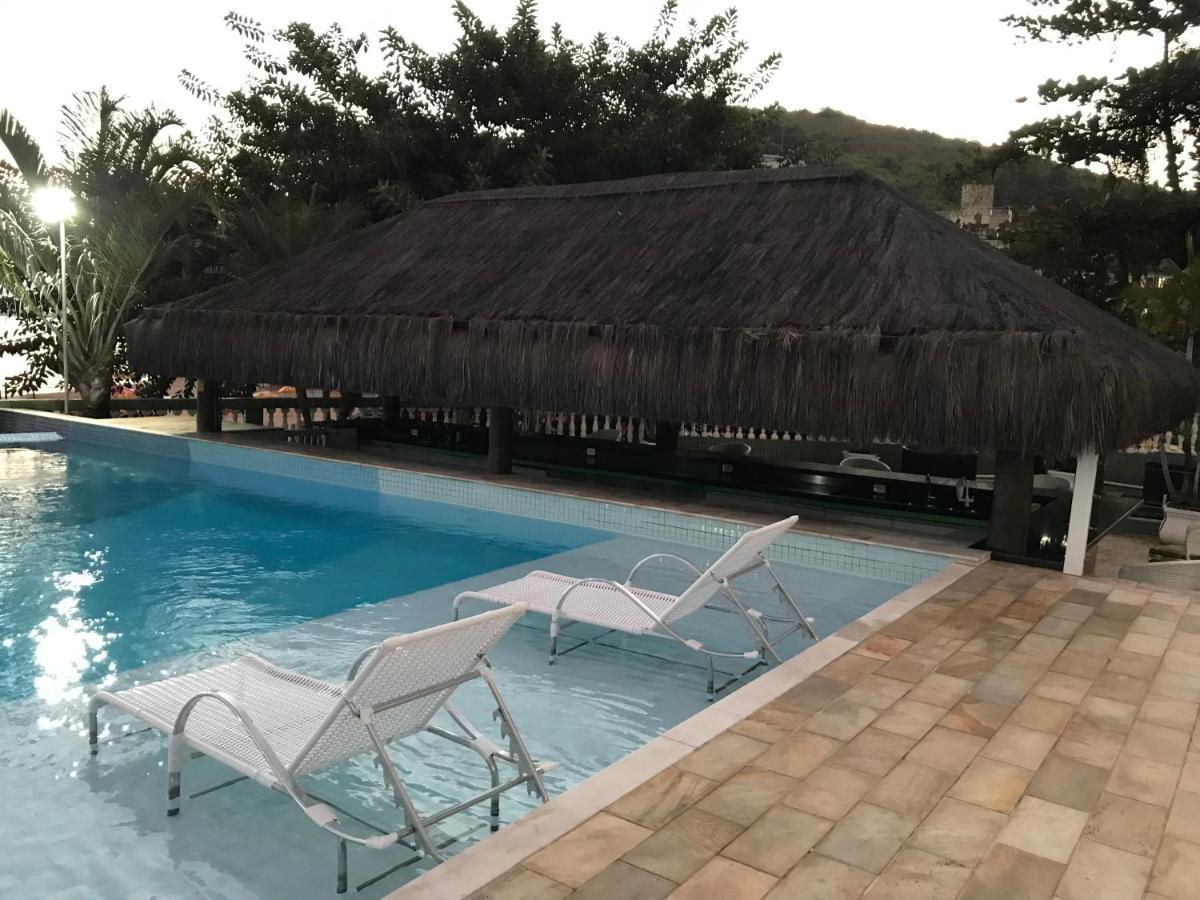 Apartamento pé na areia frente para o Mar e piscina na Prainha Caraguatatuba Extérieur photo