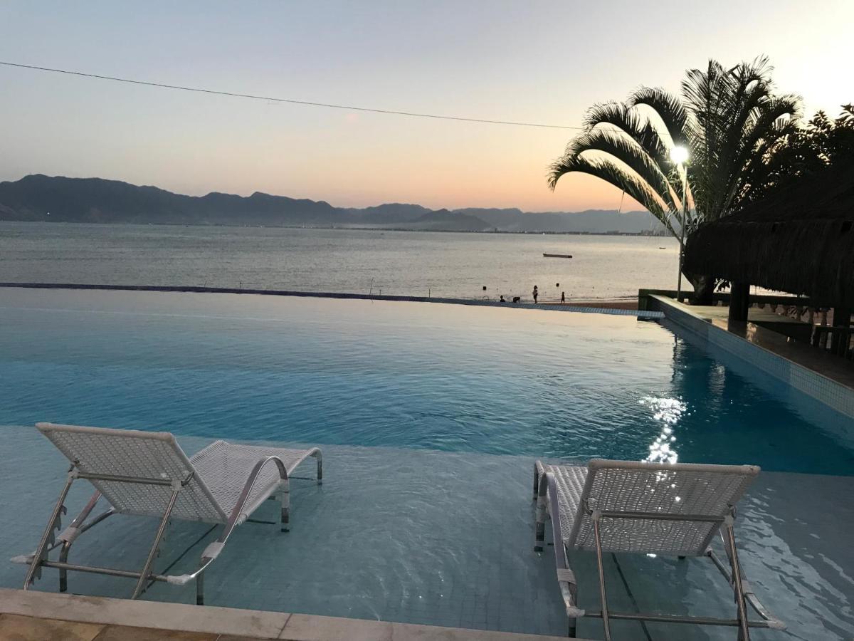 Apartamento pé na areia frente para o Mar e piscina na Prainha Caraguatatuba Extérieur photo