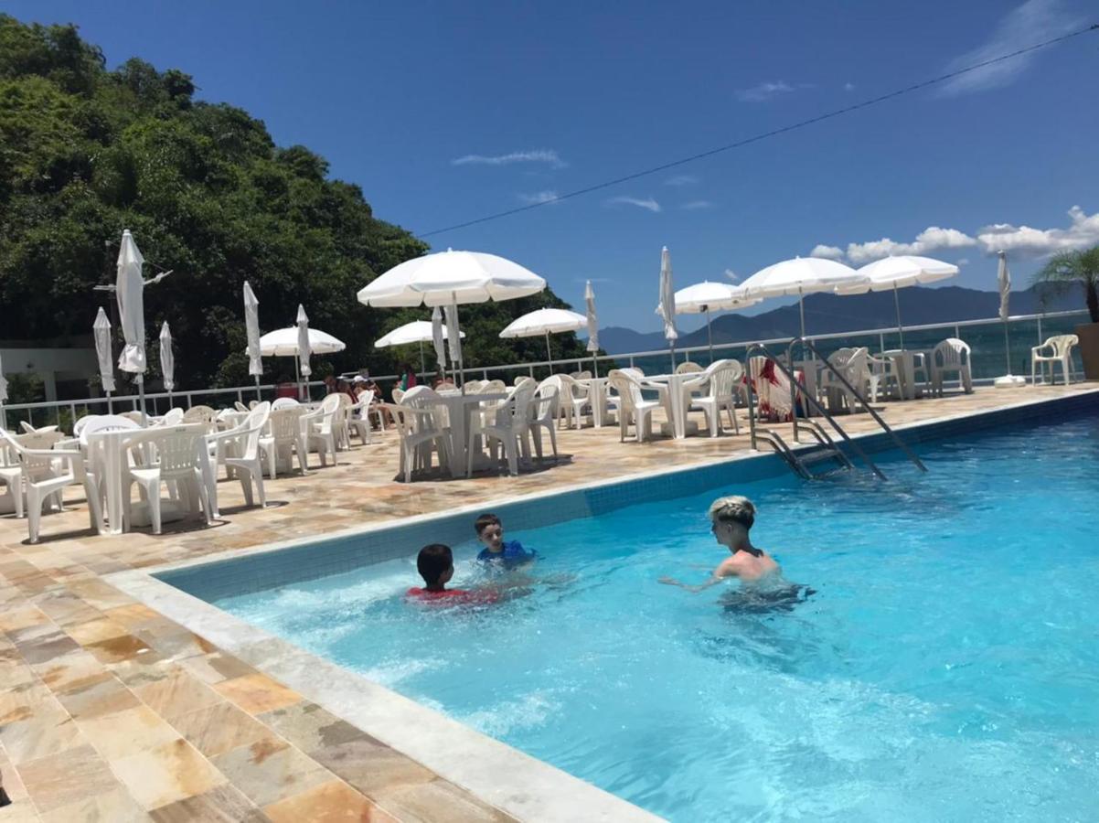 Apartamento pé na areia frente para o Mar e piscina na Prainha Caraguatatuba Extérieur photo
